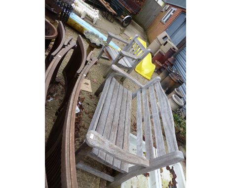 A TEAK GARDEN BENCH AND ARMCHAIR.