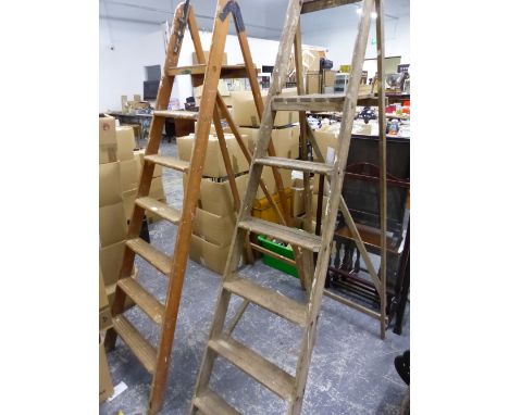 TWO LARGE ORNAMENTAL STEP LADDERS. 