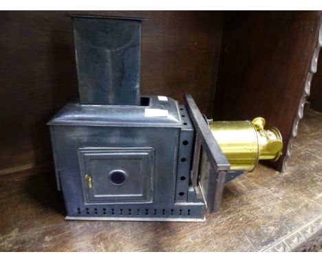 AN ANTIQUE MAGIC LANTERN. 