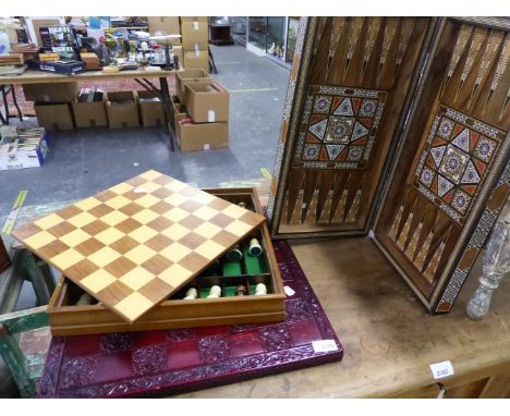 A FOLDING BACKGAMMON BOARD, CHESS SET AND BOARD. 