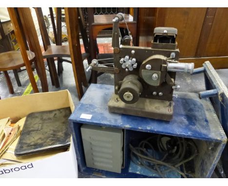 BELL AND HOWELL PROJECTOR  AND A SMALL QTY OF 78RPM RECORDS. 