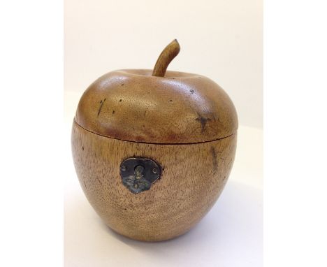 A fruitwood tea caddy modelled as an Apple.