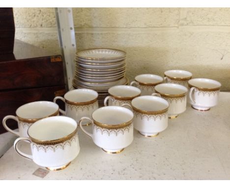 The residue of a Royal Albert bone china tea service, decorated in the Athena pattern.