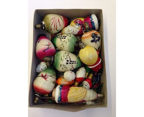 A carton containing a quantity of vintage Christmas tree light bulbs.