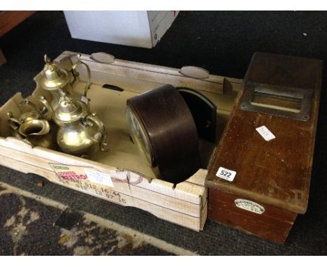 A wooden cash till together with a mantle clock and four piece metal teaset.