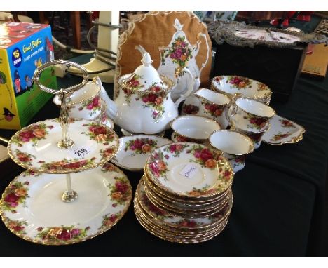 The residue of a Royal Albert bone china tea service, decorated in the Old Country Roses pattern.