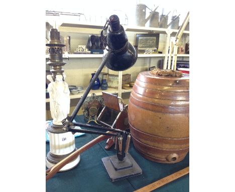An early 20th century black painted Herbert Terry angle poise lamp base.