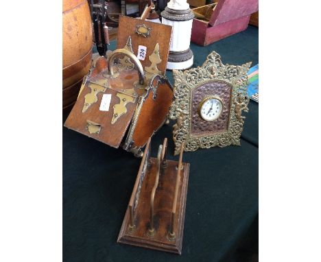 A novelty late 19th/early 20th century biscuiteer modelled as a double sided oak and brass mounted coal box together with a b