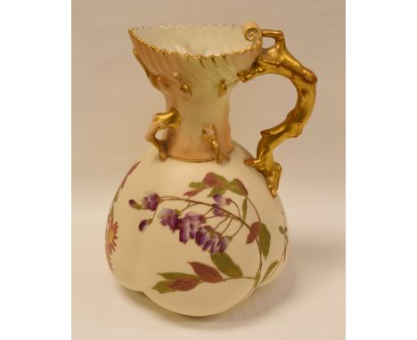 ROYAL WORCESTER BLUSH-IVORY JUG the body with gilded and painted flowers on branches and having a gilded twig-handle terminat