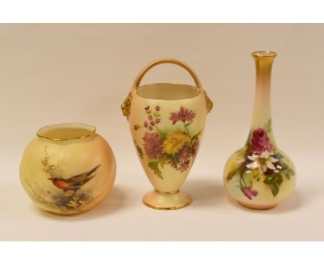 THREE ROYAL WORCESTER BLUSH IVORY ITEMS being a small globular vase painted with a robin, a floral vase with over-handle and 