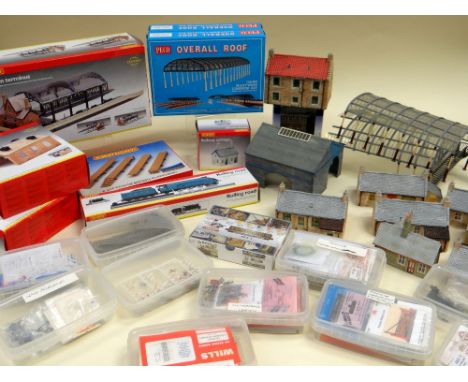 A LARGE COLLECTION OF MODEL RAILWAY BUILDINGS and accessories including stations, engine sheds, signal boxes, little people, 