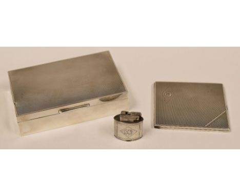 MACHINE TURNED SILVER CIGARETTE CASE, A SIMILAR CIGARETTE BOX & A SILVER LIGHTER, the cigarette case with monogrammed motif, 