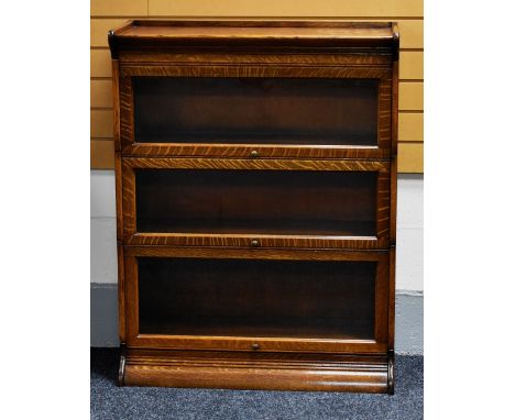 A GLOBE WERNICKE STYLE THREE SECTION BOOKCASE, 110 x 87 cms