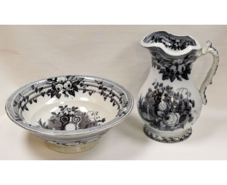 A NINETEENTH CENTURY STAFFORDSHIRE JUG AND BASIN monochrome decorated with garden scenes and with floral and ivy borders, bas