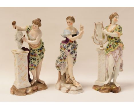 A TRIO OF CONTINENTAL PORCELAIN CLASSICAL FIGURINES, being a standing lyre-player, a sculptor and another instrument playing 