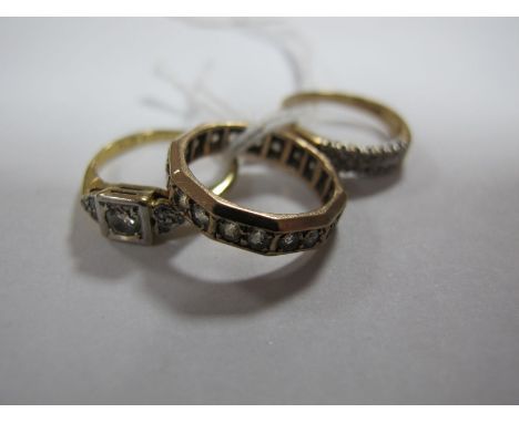 A Single Stone Ring, inset between stone set shoulders, stamped "18ct"; together with an eternity style band, indistinctly st