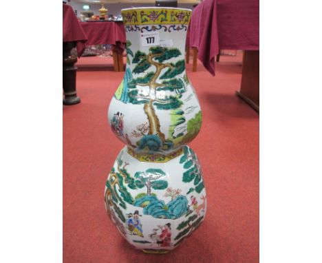 A XX Century Chinese Vase, of octagonal double gourd  form, hand painted enamel decoration of figures and animals in a landsc
