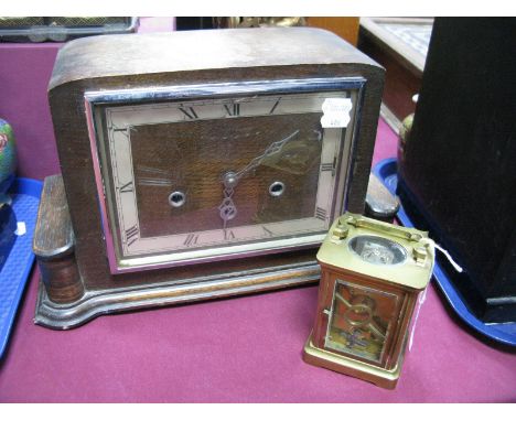 Rambridge of Salisbury Brass Cased Carriage Clock, with key. An oak Westminster chime mantel clock. 