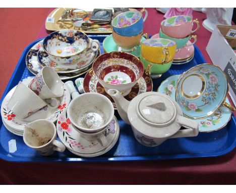 A Copelands Grosvenor  Harlequin China Tea Service, with handpainted floral design to the cup internal bowls gilt highlights,