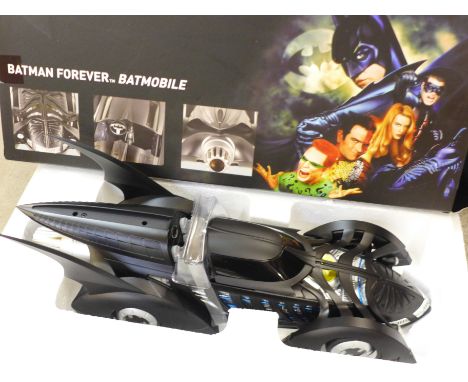 A Hot Wheels Batman Forever Batmobile, 1:18 scale, boxed