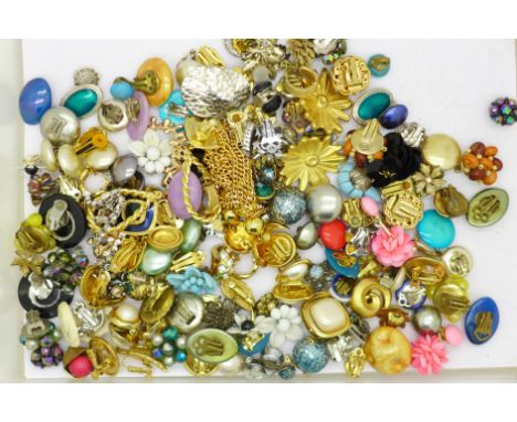Over eighty pairs of vintage clip-on earrings