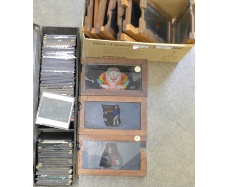 A collection of glass slides showing Indian and European scenes together with a box of magic lantern slides, c.1900