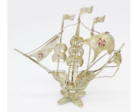 An 835 silver model ship with enamel red cross emblems, 10cm