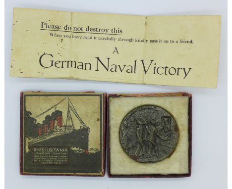 A German Lusitania medal and a propaganda leaflet