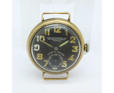 A 9ct gold Zenith black faced midi trench watch, retailed by Birch &amp; Gaydon Ltd., also marked Land &amp; Water, Glasgow i
