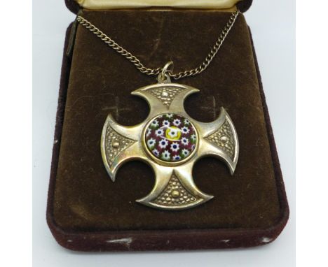 A silver set Caithness glass pendant