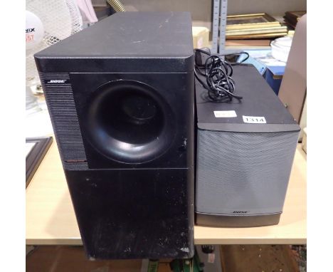 Bose Companion 5 multi media speaker system and an Acoustimass speaker. All electrical items in this lot have been PAT tested