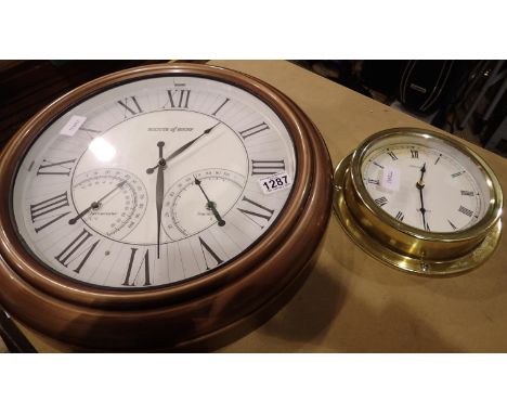 Scots of Stow quartz wall clock with thermometer and humidity dials and a Wellington quartz wall clock. Not available for in-