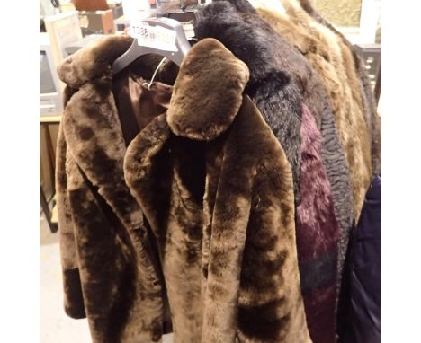 Twelve fur coats, mainly size M. Not available for in-house P&amp;P 