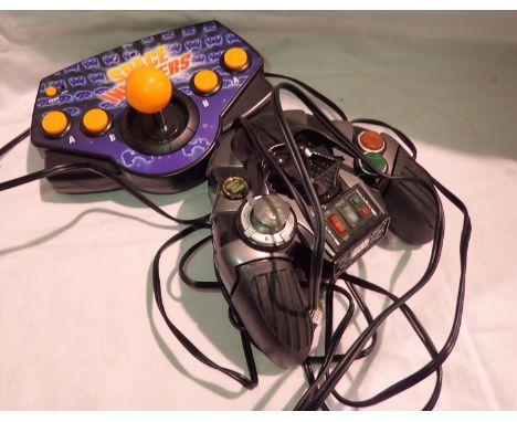 Two retro style games controllers, Space Invaders and Star Wars. P&amp;P Group 1 (£14+VAT for the first lot and £1+VAT for su