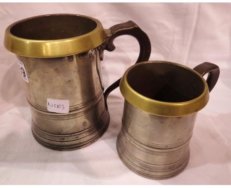 Two Victorian pewter tankards with brass rims by G Farmiloe &amp; Sons, both VR18. P&amp;P Group 2 (£18+VAT for the first lot