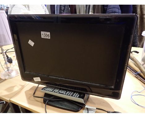 Toshiba LCD TV/DVD combination, model no 19DV665DB, with remote. All electrical items in this lot have been PAT tested for sa