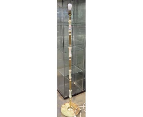 Onyx and brass standard lamp, H: 170 cm. All electrical items in this lot have been PAT tested for safety and have passed. Th