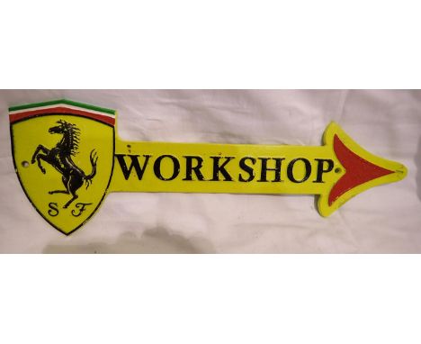 Cast iron Ferrari workshop arrow, L: 40 cm. P&amp;P Group 1 (£14+VAT for the first lot and £1+VAT for subsequent lots) 