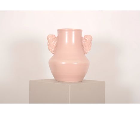 A POOLE POTTERY 'PASTEL PINK' TWIN HANDLED VASE20th century, marked to the base, 38cm high