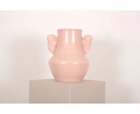 A POOLE POTTERY 'PASTEL PINK' TWIN HANDLED VASE20th century, marked to the base, 38cm high