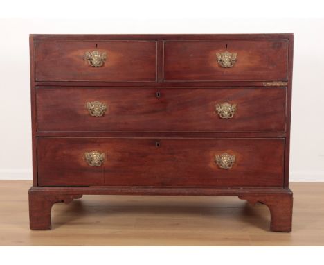 A GEORGE III MAHOGANY CHEST OF DRAWERSthe caddy top with 'chequer board' veneer, two short and three long drawers beneath, on