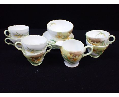 SHELLEY: A SET OF SIX "DAFFODIL" DESIGN COFFEE CUPS with saucers, sugar bowl and cream jug