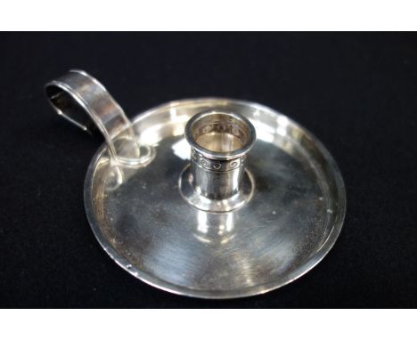 A SILVER CHAMBER STICK 130g