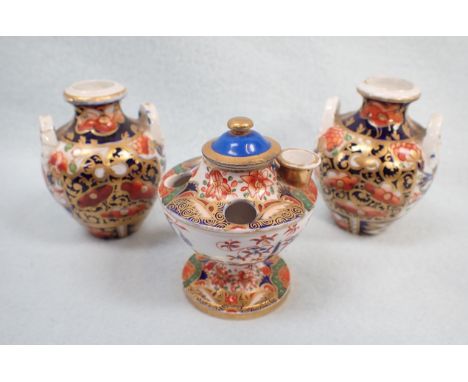 A PAIR OF 19TH CENTURY DERBY VASES 8cm high (one handle glued) and 19th century Spode inkwell, 6.5cm high with an associated 