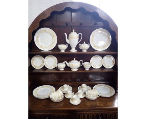 A WEDGWOOD 'MIMOSA' PART DINNER SERVICE including coffee cans and saucers