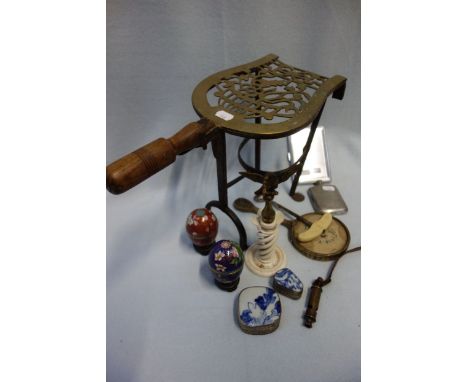 A 19TH CENTURY TURNED IVORY STAND (damaged) supporting a brass eagle, two cloisonne eggs, a Vintage whistle and sundries
