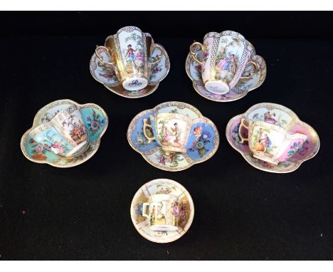 A COLLECTION OF DRESDEN CABINET CUPS AND SAUCERS