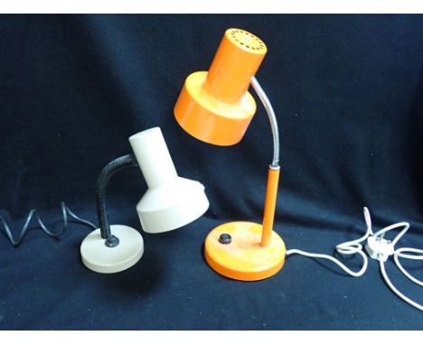 A 1980S ADJUSTABLE DESK LAMP, IN ORANGE  and another similar