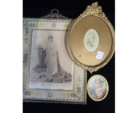 AN EARLY 19TH CENTURY MINIATURE OF CAROLINE BAYNHAM a gilt framed photographic portrait and an Edwardian gilt and needlework 