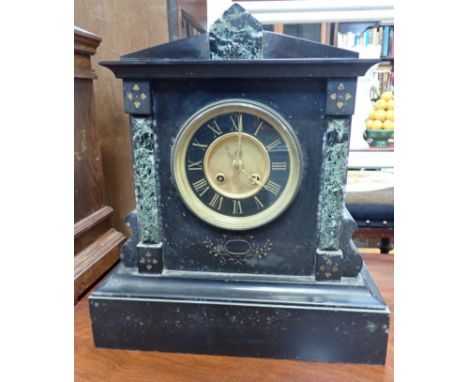 A VICTORIAN SLATE MANTEL CLOCK, WITH FRENCH MOVEMENT striking on a gong 32 cm wide